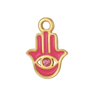 Pendentif Main de Fatma doré avec émail rose et cristal central pour la création de bijoux