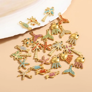 Colorful rhinestone ocean charms set with gold fish and starfish for DIY jewelry making