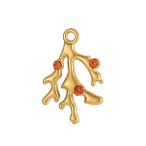 Detailed view of gold coral branch pendant with orange gemstones for DIY jewelry
