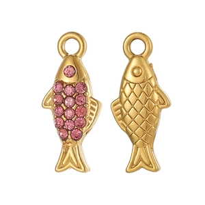 Detailed view of fish-shaped gold pendant with pink rhinestones and scale texture