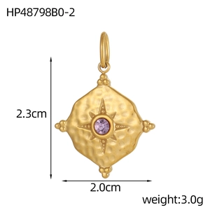 Detail view of vintage oval gold pendant with purple gemstone and size measurements