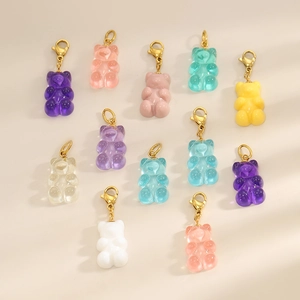 Colorful resin gummy bear pendants with golden rings for DIY jewelry making