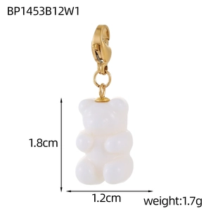 Detail view of a white gummy bear pendant with golden lobster clasp and size measurements