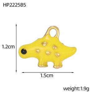 Pendentif dinosaure en émail jaune affichant les dimensions 1,5 cm sur 1,2 cm
