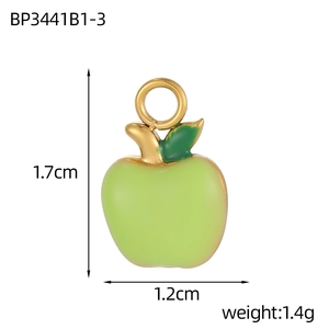 Detail view of a green apple pendant with 1.7cm height and 1.2cm width measurements