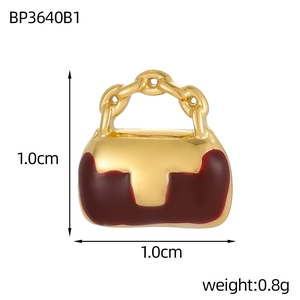 Detailed view of 1.0cm gold handbag charm with red enamel finish for DIY jewelry