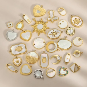 Colgantes vintage franceses de acero inoxidable chapado en oro con nácar para joyería