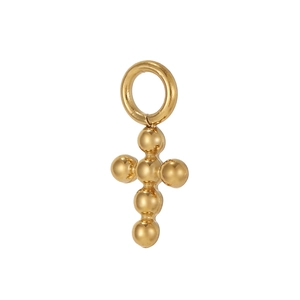 Macro detail of a golden cross pendant with smooth spherical design and metallic finish