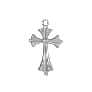 Detailed macro view of polished stainless steel cross pendant with heart center