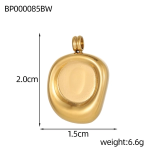 Detailed view of an irregular organic golden pendant with dimensions 2.0cm by 1.5cm