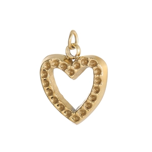 Close-up of golden heart pendant with embossed dot texture and hollow design