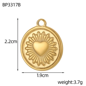 Macro view of gold heart pendant with dimensions showing 2.2cm height and 1.9cm width
