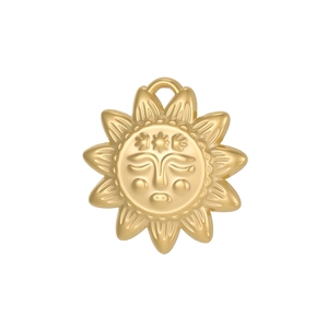 Detailed relief of a gold sun face pendant with vintage celestial style for necklaces