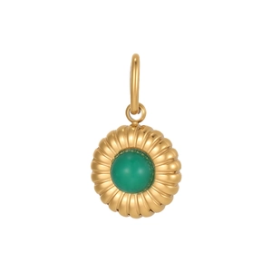 Macro shot of gold-plated round pendant with green natural stone and ribbed edge texture