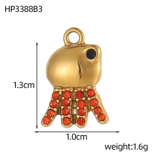Detail van gouden octopushanger met oranje strass-steentjes en 1,3 cm afmetingen