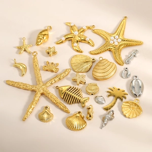 Nautical sea life charms set featuring starfish and shells in gold and silver plating