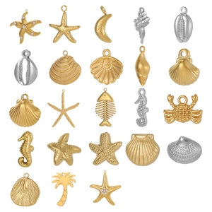 Golden ocean series DIY charms including starfish, seashells, and crabs for jewelry making