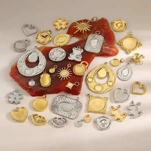 Various stainless steel geometric and animal shaped DIY jewelry pendant bases in gold and silver