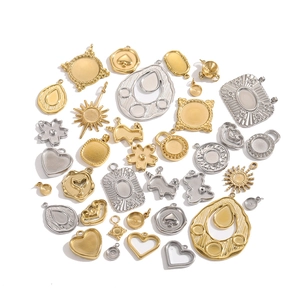 Assorted gold and silver stainless steel geometric jewelry charm bases for DIY crafting