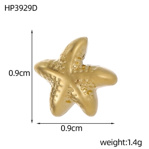 Detailed view of a 0.9cm gold starfish pendant in stainless steel with textured finish