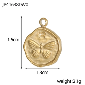 Detailed view of heart-shaped gold butterfly pendant with size and weight dimensions