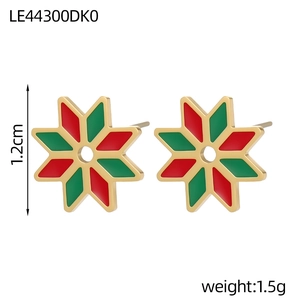 Detail shot of 1.2cm octagonal star stud earrings in red and green enamel coating