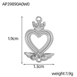 Detailed view of silver heart pendant with crown and wing motifs, dimensions shown