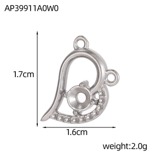 Close-up of a silver geometric heart pendant blank with round prong setting base