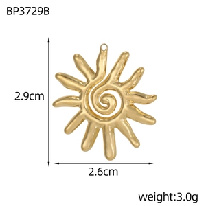 Macro shot showing 2.9cm height and 2.6cm width dimensions for the golden sun pendant