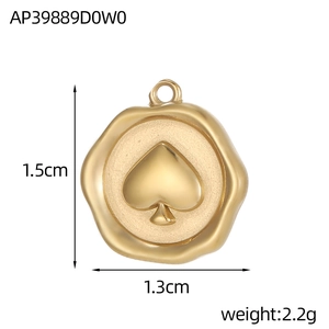 Detail of vintage gold heart-shaped spade pendant with 1.5cm dimension and wax seal style