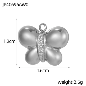 Polished butterfly charm with dimension measurements 1.2x1.6cm and weight specs