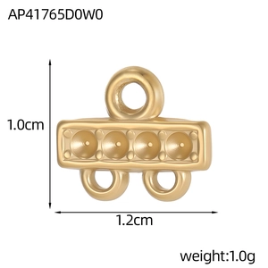 Detailed view of a gold stainless steel heart connector with dimensions 1.0cm x 1.2cm