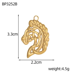 Macro view of gold-plated hollow horse head pendant with artistic Celtic knot design