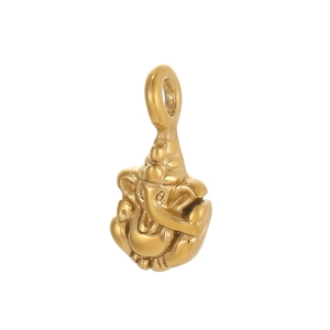 Detailed close-up of a polished gold Ganesha pendant with intricate elephant details