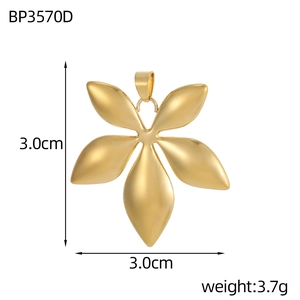 Macro shot of 3cm golden five-petal flower pendant with matte finish and bail detail