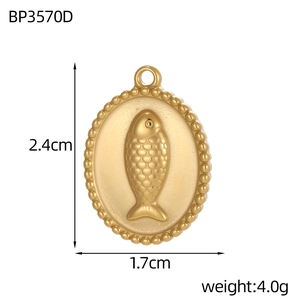 Detailed oval gold fish pendant with embossed pattern and measurements 2.4cm by 1.7cm