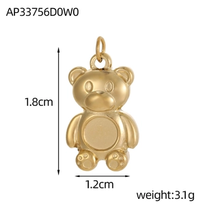 Detailed view of a gold bear pendant showing dimensions 1.8cm by 1.2cm and weight of 3.1g