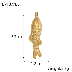 Detailed view of golden fish pendant with matte finish scales and size measurements