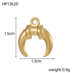 Close-up of 18K gold crescent moon pendant with 1.5cm by 1.3cm size measurements