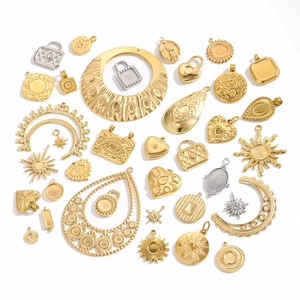 Assorted gold and silver vintage celestial DIY pendants in heart and geometric shapes