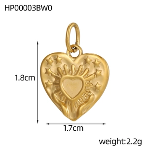 Detailed view of a gold heart pendant with star carvings and dimensions 1.8cm by 1.7cm