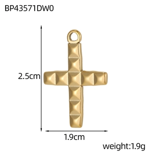 Detailed view of golden cross pendant with square rivet texture and dimensions 2.5x1.9cm