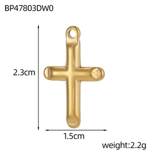 Detailed view of a gold-plated stainless steel cross pendant with size dimensions and weight