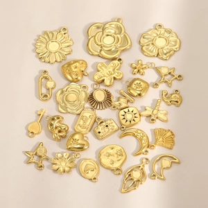 Golden stainless steel jewelry pendants collection featuring diverse DIY charms and shapes