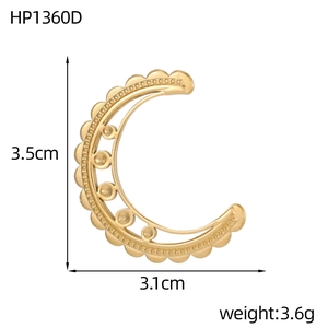 Detailed view of half-moon gold metal pendant showing 3.5cm size and 3.6g weight