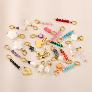 Elegant DIY charm set with stars, pearls and colored stone pendants in gold finish