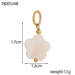 Macro shot of 1.7cm flower shell pendant with golden ring and natural silk texture