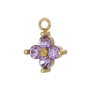 Macro shot of gold-plated star pendant featuring four purple round-cut zircon crystals