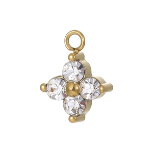 Macro view of gold flower charm with four clear zircons and top jump ring detail