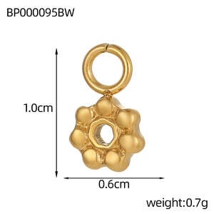 Detail showing 1.0cm by 0.6cm dimensions of golden stainless steel heart flower pendant